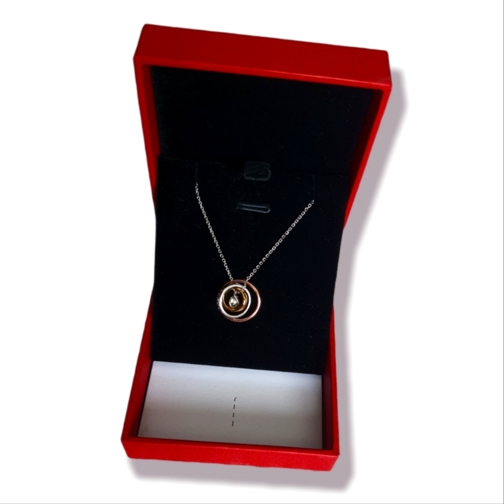 LOVE, DREAM, HAPPINESS orbiting bands sterling silver necklace